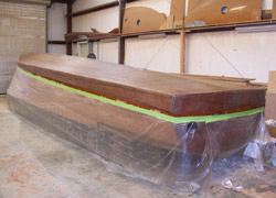 New bottom being glassed and coated with epoxy